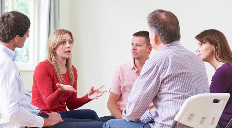 image showing a group therapy session at a rehab centre