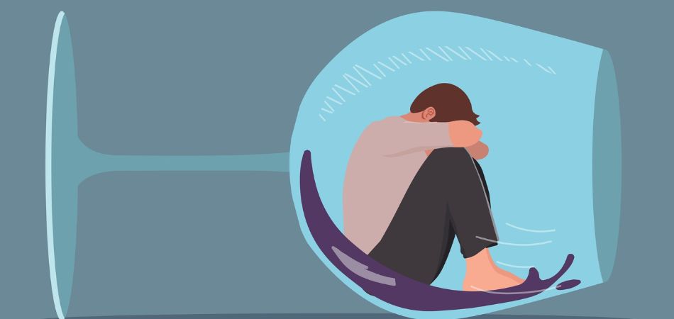 man in glass of alcohol